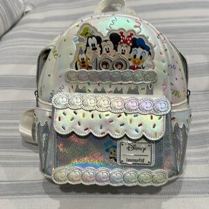 NWT Disney Loungefly backpack - 100th anniversary edition.  White/Silver